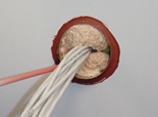 Sealing electrical openings